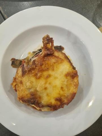 porzione di parmigiana di melanzane